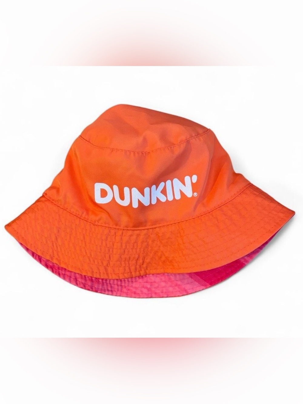 Dunkin' adult sized reversible orange + pink bucket hat with white logo
